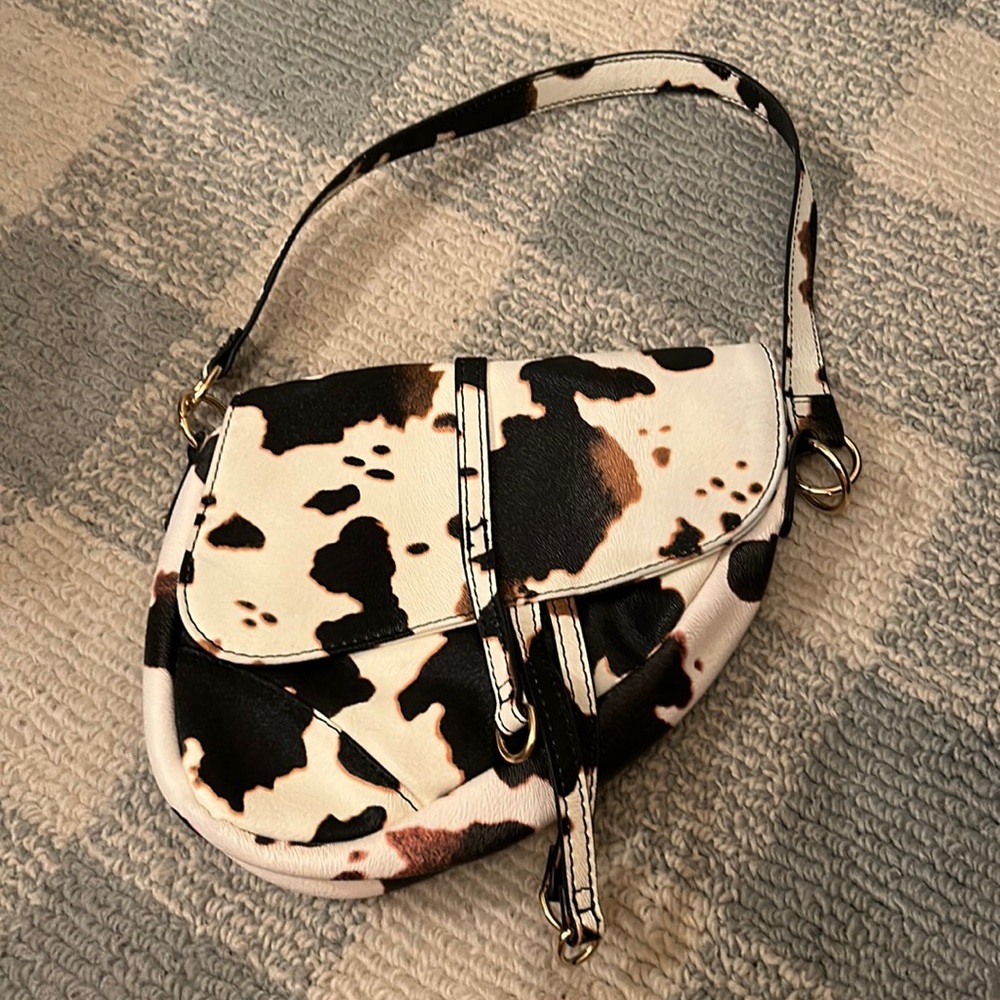 Cow print saddle bag